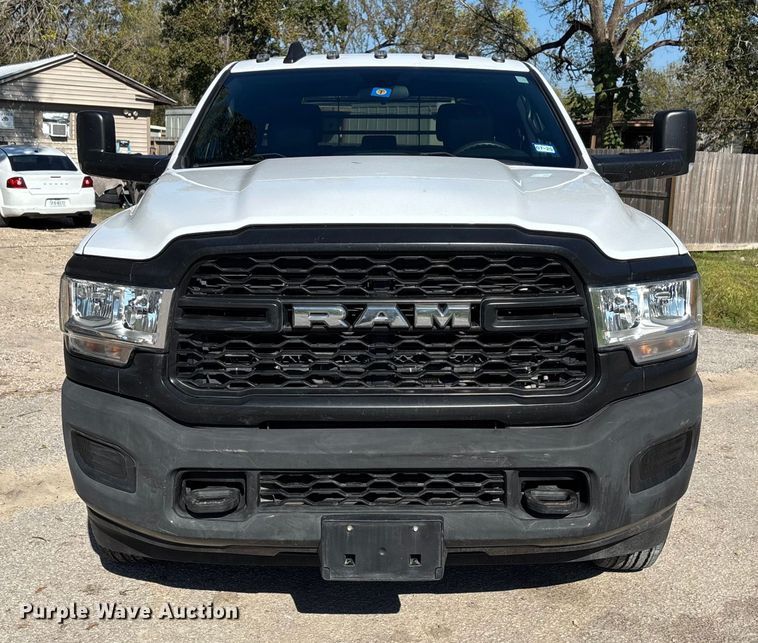 image for item DT4983 2022 RAM 3500HD Crew Cab flatbed pickup truck