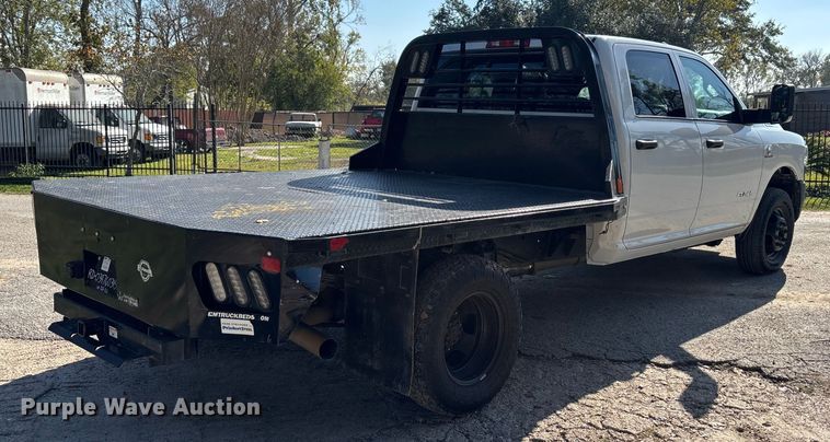 image for item DT4983 2022 RAM 3500HD Crew Cab flatbed pickup truck