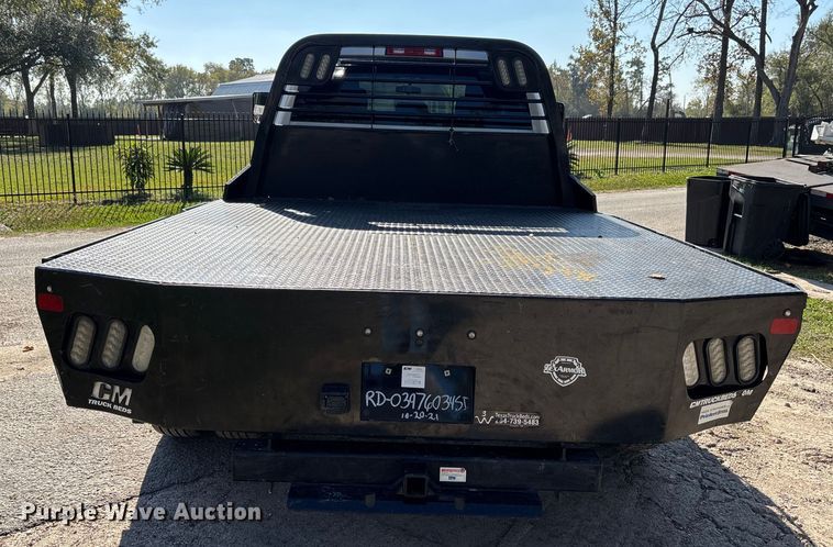 image for item DT4983 2022 RAM 3500HD Crew Cab flatbed pickup truck