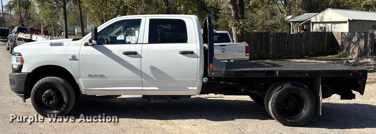 image for item DT4983 2022 RAM 3500HD Crew Cab flatbed pickup truck