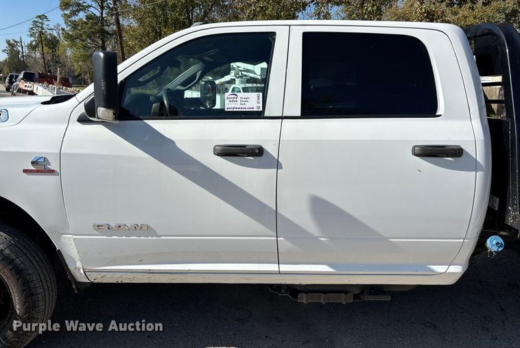 image for item DT4983 2022 RAM 3500HD Crew Cab flatbed pickup truck