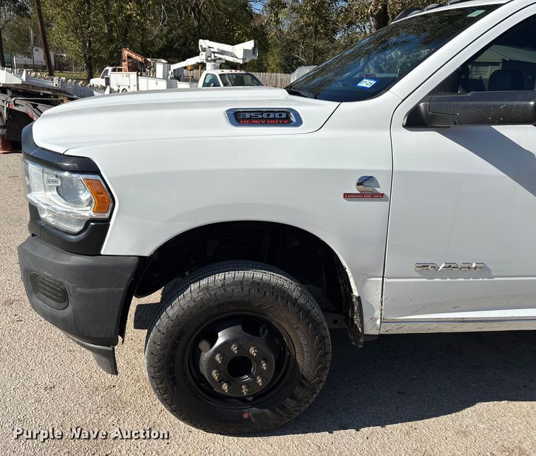 image for item DT4983 2022 RAM 3500HD Crew Cab flatbed pickup truck