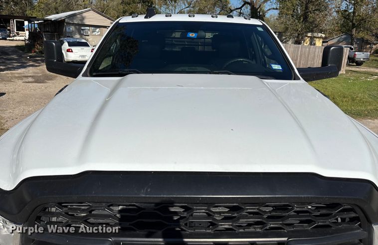 image for item DT4983 2022 RAM 3500HD Crew Cab flatbed pickup truck