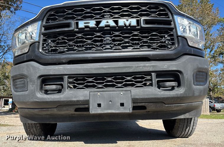image for item DT4983 2022 RAM 3500HD Crew Cab flatbed pickup truck