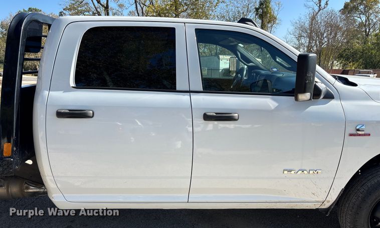 image for item DT4983 2022 RAM 3500HD Crew Cab flatbed pickup truck