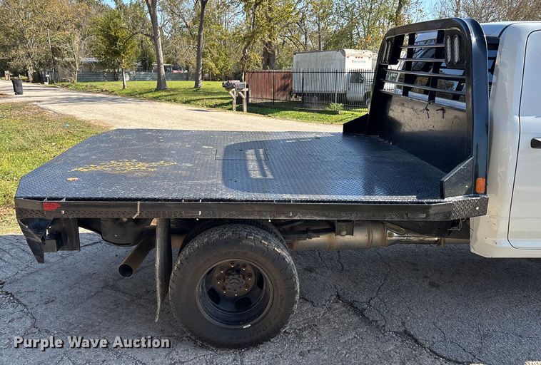 image for item DT4983 2022 RAM 3500HD Crew Cab flatbed pickup truck