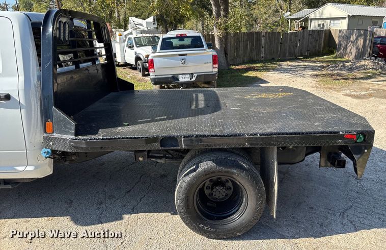 image for item DT4983 2022 RAM 3500HD Crew Cab flatbed pickup truck