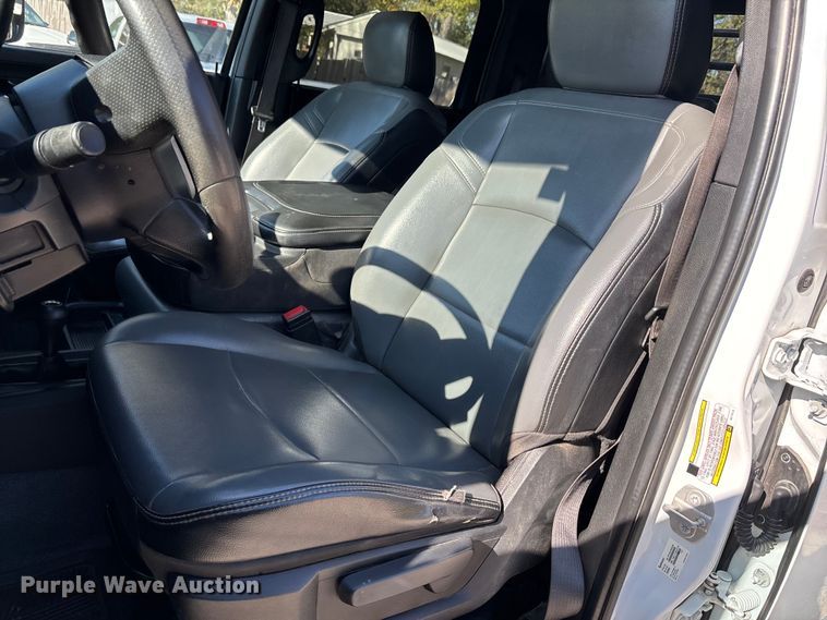 image for item DT4983 2022 RAM 3500HD Crew Cab flatbed pickup truck