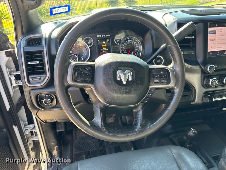 image for item DT4983 2022 RAM 3500HD Crew Cab flatbed pickup truck