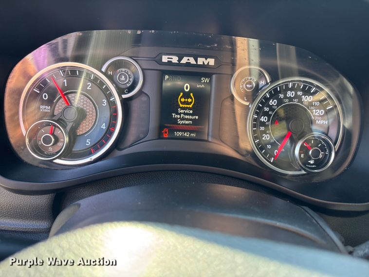 image for item DT4983 2022 RAM 3500HD Crew Cab flatbed pickup truck