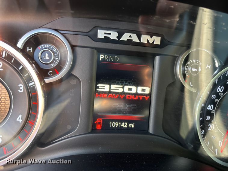 image for item DT4983 2022 RAM 3500HD Crew Cab flatbed pickup truck