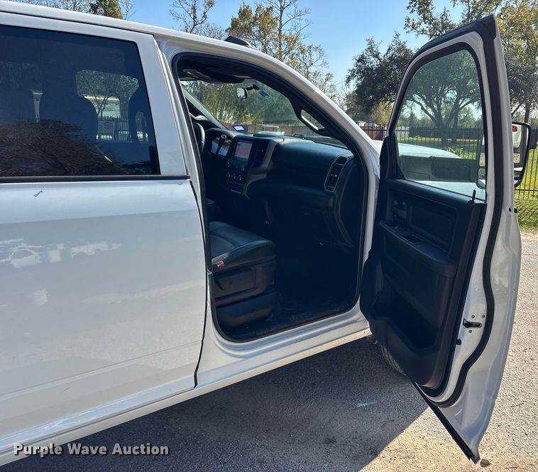 image for item DT4983 2022 RAM 3500HD Crew Cab flatbed pickup truck