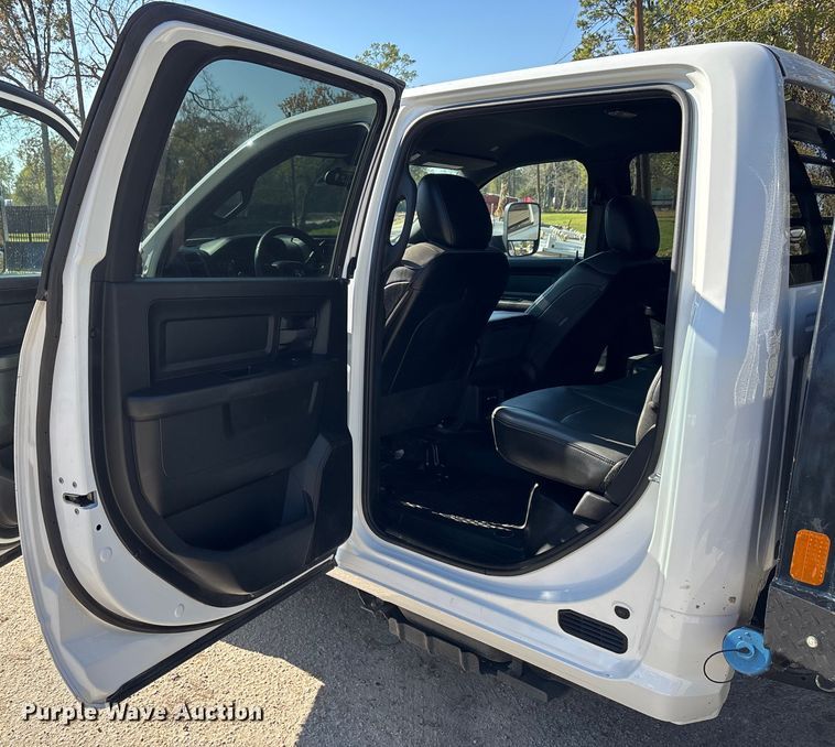 image for item DT4983 2022 RAM 3500HD Crew Cab flatbed pickup truck