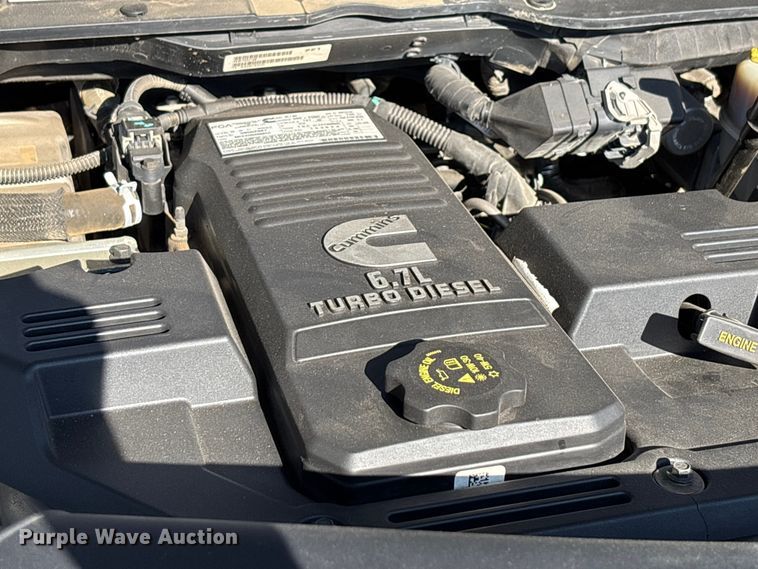 image for item DT4983 2022 RAM 3500HD Crew Cab flatbed pickup truck