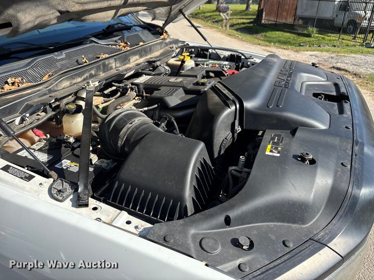 image for item DT4983 2022 RAM 3500HD Crew Cab flatbed pickup truck