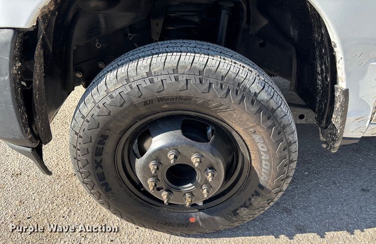 image for item DT4983 2022 RAM 3500HD Crew Cab flatbed pickup truck