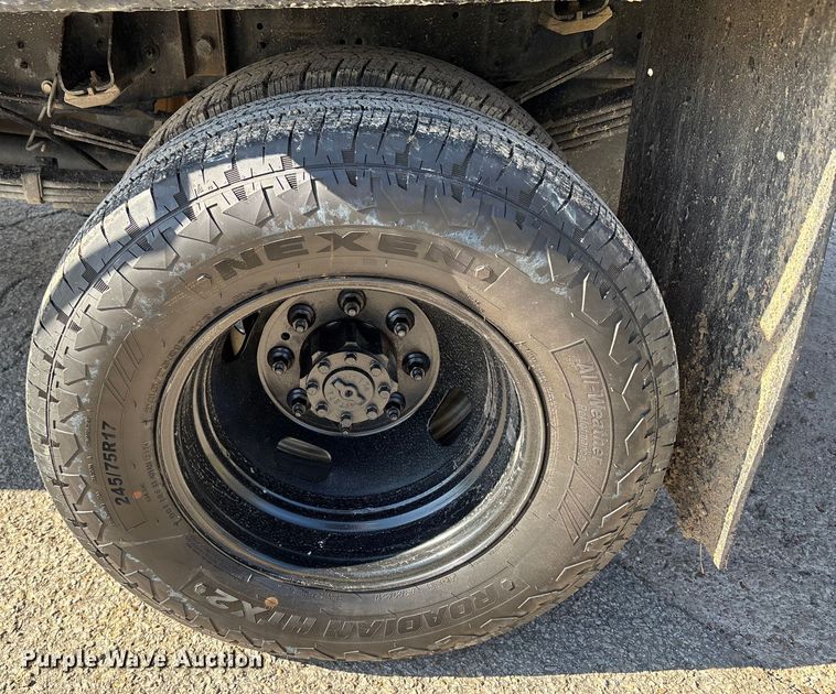 image for item DT4983 2022 RAM 3500HD Crew Cab flatbed pickup truck