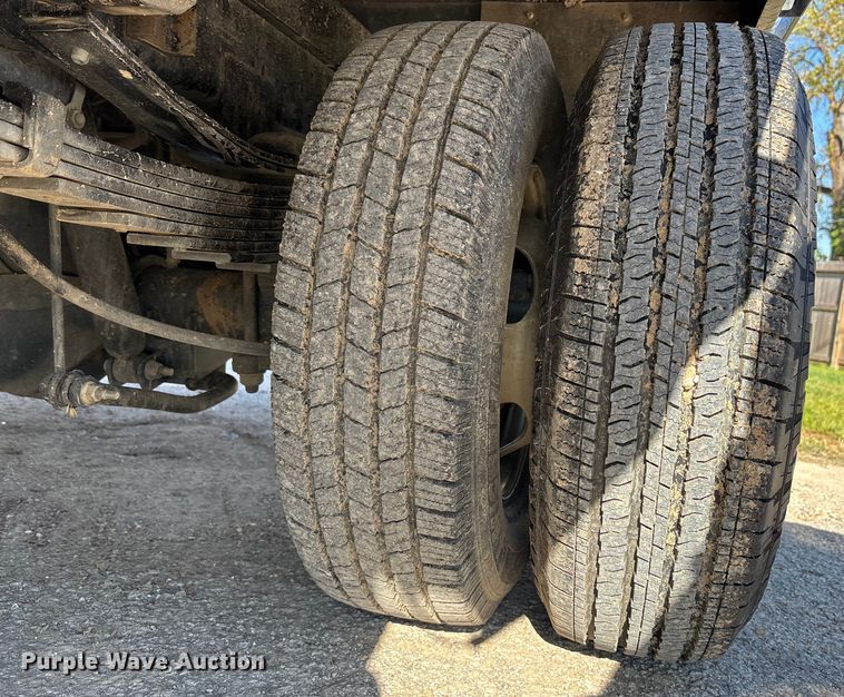 image for item DT4983 2022 RAM 3500HD Crew Cab flatbed pickup truck