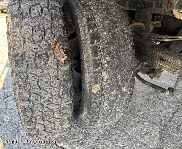 image for item DT4983 2022 RAM 3500HD Crew Cab flatbed pickup truck