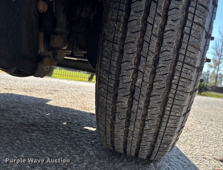 image for item DT4983 2022 RAM 3500HD Crew Cab flatbed pickup truck