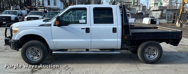 image for item DV0766 2016 Ford F350 Super Duty Crew Cab flatbed pickup truck