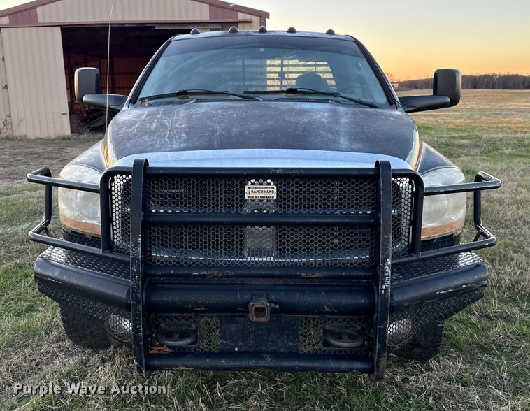 image for item DW5182 2006 Dodge Ram 3500 Big Horn Quad Cab flatbed pickup truck