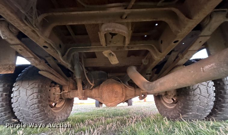 image for item DW5182 2006 Dodge Ram 3500 Big Horn Quad Cab flatbed pickup truck