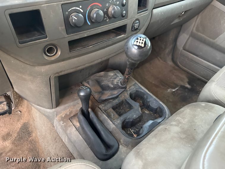 image for item DW5182 2006 Dodge Ram 3500 Big Horn Quad Cab flatbed pickup truck