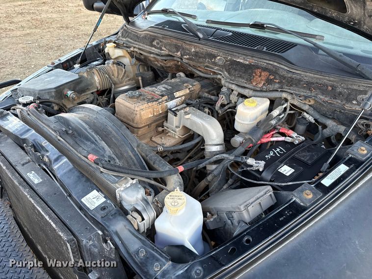 image for item DW5182 2006 Dodge Ram 3500 Big Horn Quad Cab flatbed pickup truck