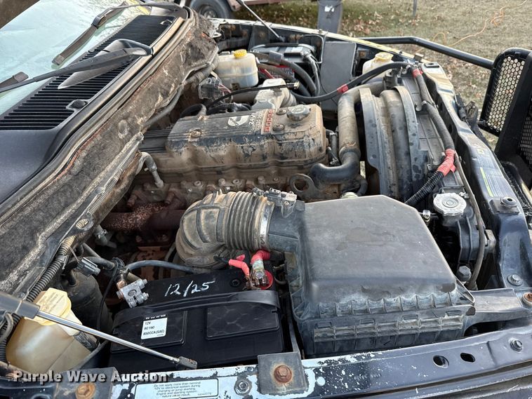 image for item DW5182 2006 Dodge Ram 3500 Big Horn Quad Cab flatbed pickup truck