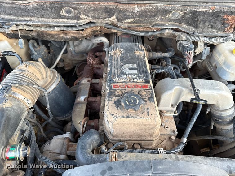 image for item DW5182 2006 Dodge Ram 3500 Big Horn Quad Cab flatbed pickup truck