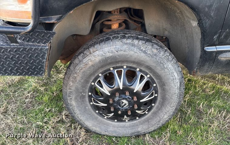 image for item DW5182 2006 Dodge Ram 3500 Big Horn Quad Cab flatbed pickup truck