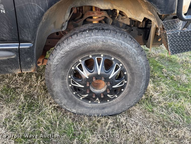 image for item DW5182 2006 Dodge Ram 3500 Big Horn Quad Cab flatbed pickup truck