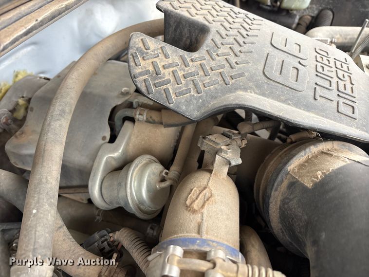 image for item EA7813 2002 Chevrolet Silverado 2500HD Crew Cab utility bed pickup truck