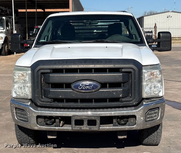 image for item EA7818 2014 Ford F250 Super Duty SuperCab flatbed pickup truck