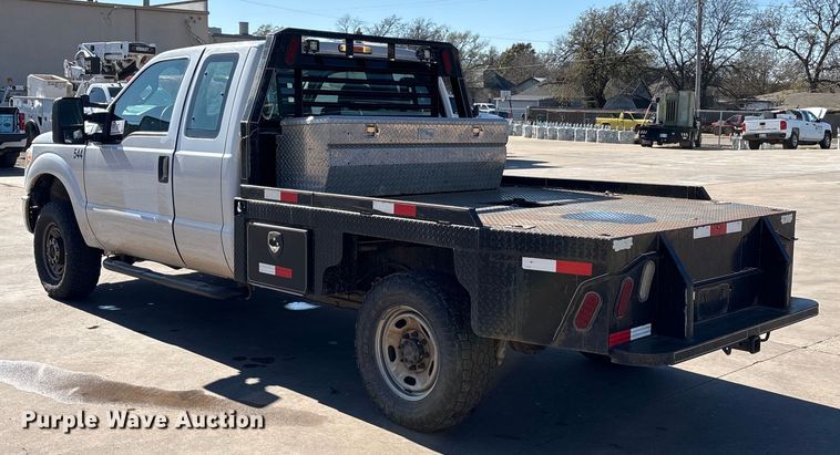 image for item EA7818 2014 Ford F250 Super Duty SuperCab flatbed pickup truck