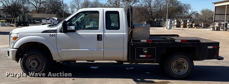 image for item EA7818 2014 Ford F250 Super Duty SuperCab flatbed pickup truck