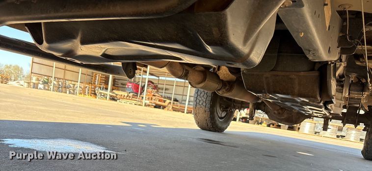 image for item EA7818 2014 Ford F250 Super Duty SuperCab flatbed pickup truck