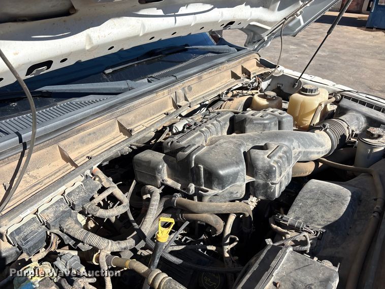 image for item EA7818 2014 Ford F250 Super Duty SuperCab flatbed pickup truck