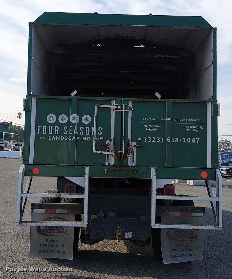 image for item EC1352 2011 Ford F650 Extended Cab chipper truck