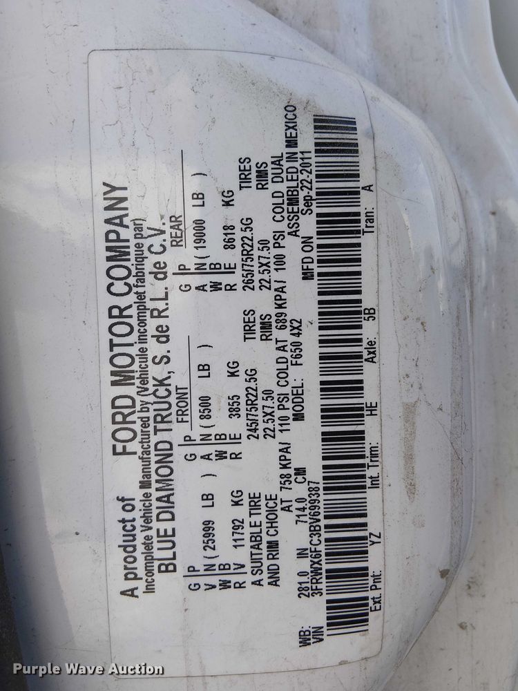 image for item EC1352 2011 Ford F650 Extended Cab chipper truck