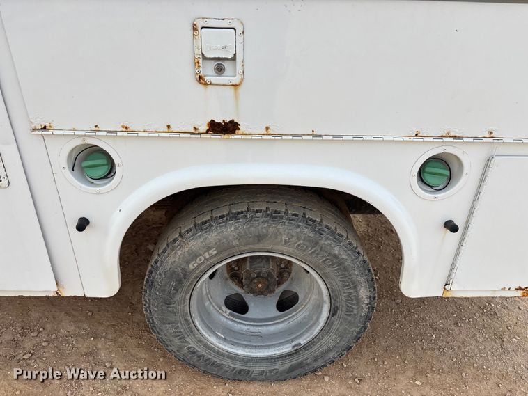 image for item ED2391 2014 Chevrolet Silverado 3500HD Crew Cab utility bed pickup truck