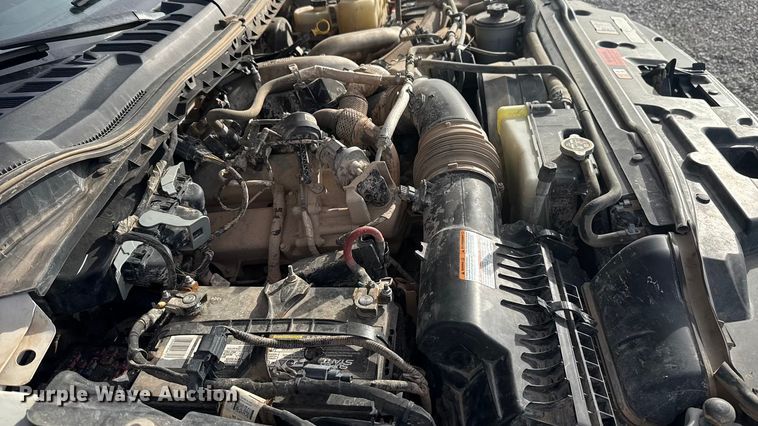 image for item EE4471 2022 Ford F250 Super Duty Crew Cab flatbed pickup truck