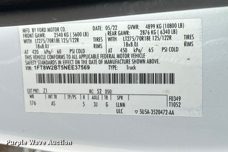 image for item EE4471 2022 Ford F250 Super Duty Crew Cab flatbed pickup truck