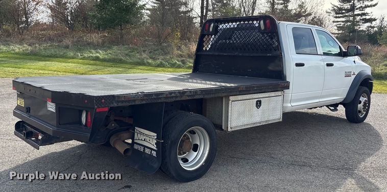 image for item EM6196 2015 RAM 5500 Crew Cab flatbed truck