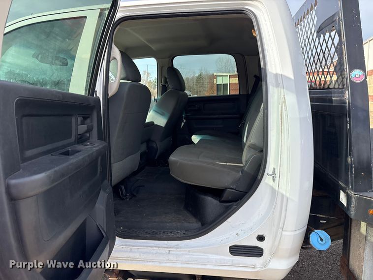 image for item EM6196 2015 RAM 5500 Crew Cab flatbed truck