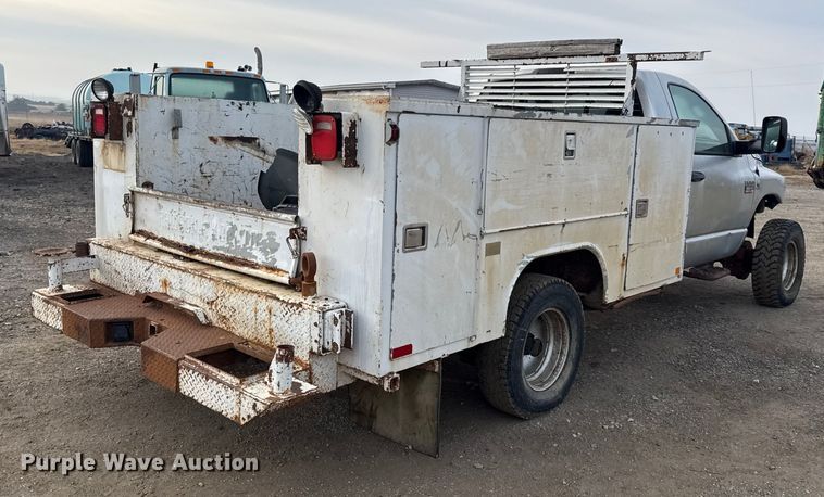 image for item EN0090 2009 Dodge Ram 3500HD utility bed pickup truck
