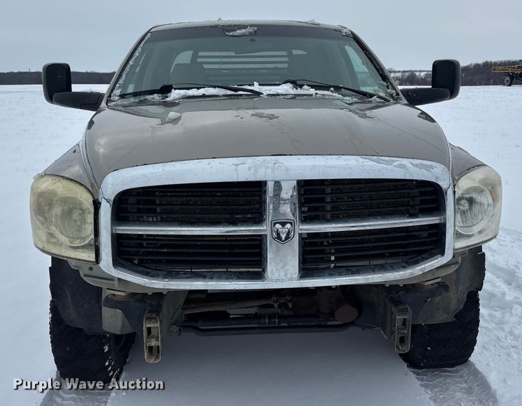 image for item EN0764 2009 Dodge Ram 2500 Quad Cab bale bed pickup truck