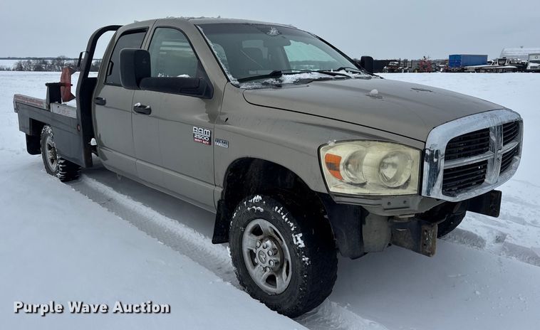 image for item EN0764 2009 Dodge Ram 2500 Quad Cab bale bed pickup truck