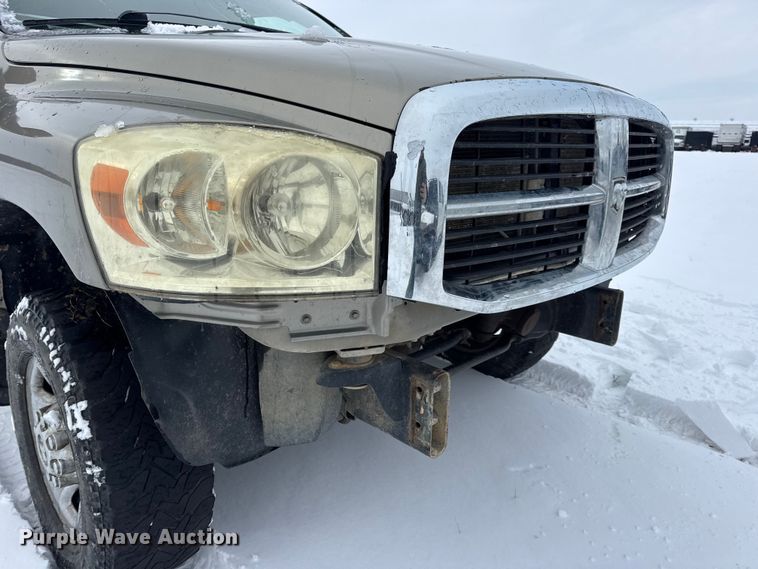 image for item EN0764 2009 Dodge Ram 2500 Quad Cab bale bed pickup truck